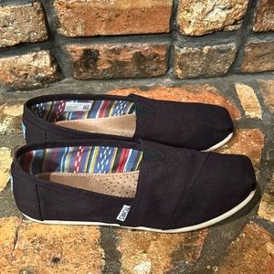 TOMS canvas type fabric shoes.